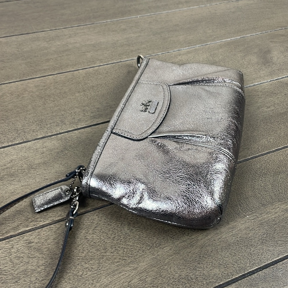 COACH metallic silver leather wristlet